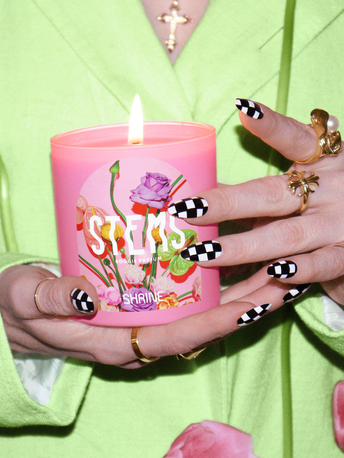 shrine stems pink floral flower candle with black and white checkered nail hands shop shrine shopshrine