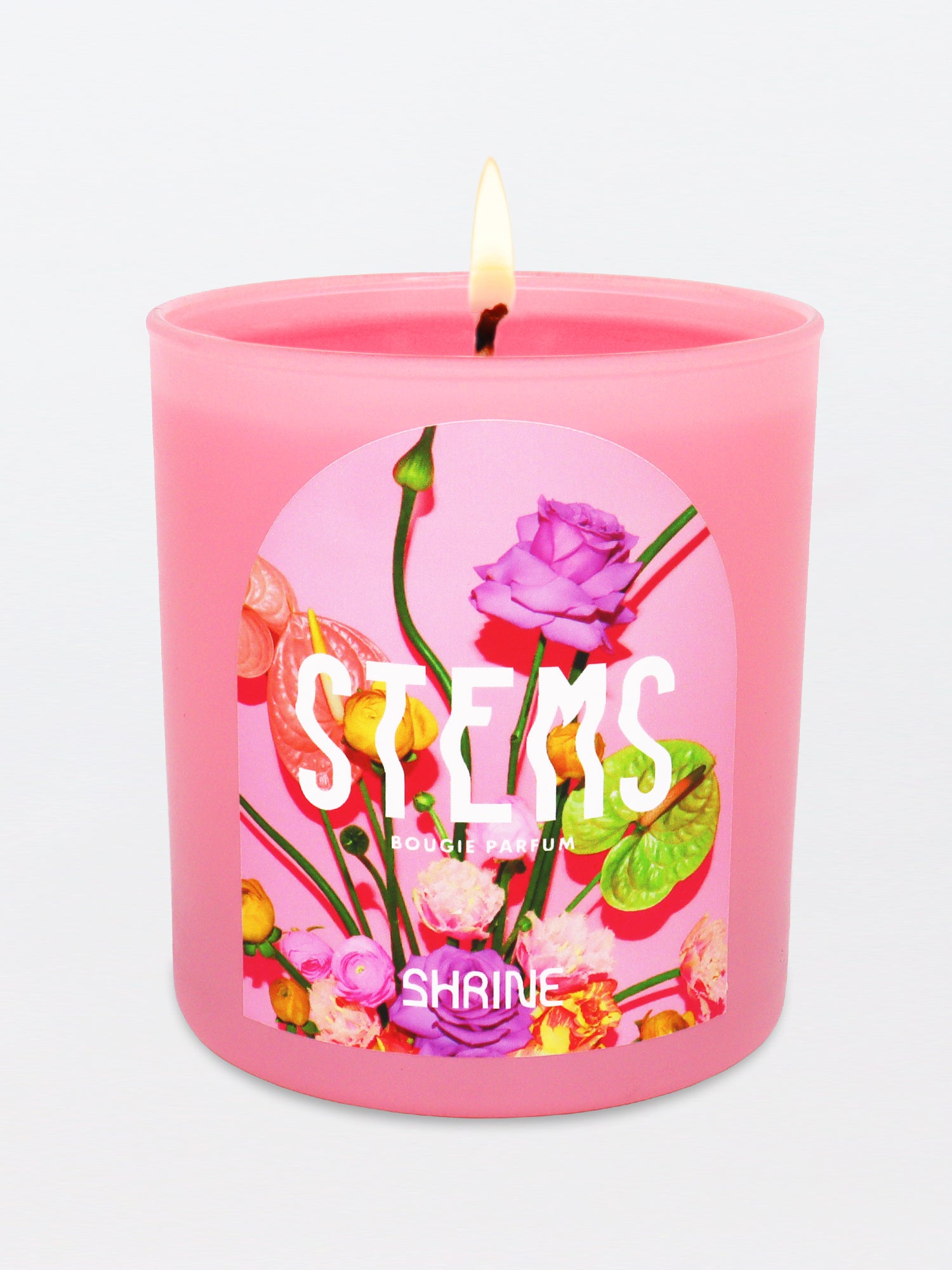 shrine stems pink floral candle with roses and anthurium flowers on the label shop shrine shopshrine