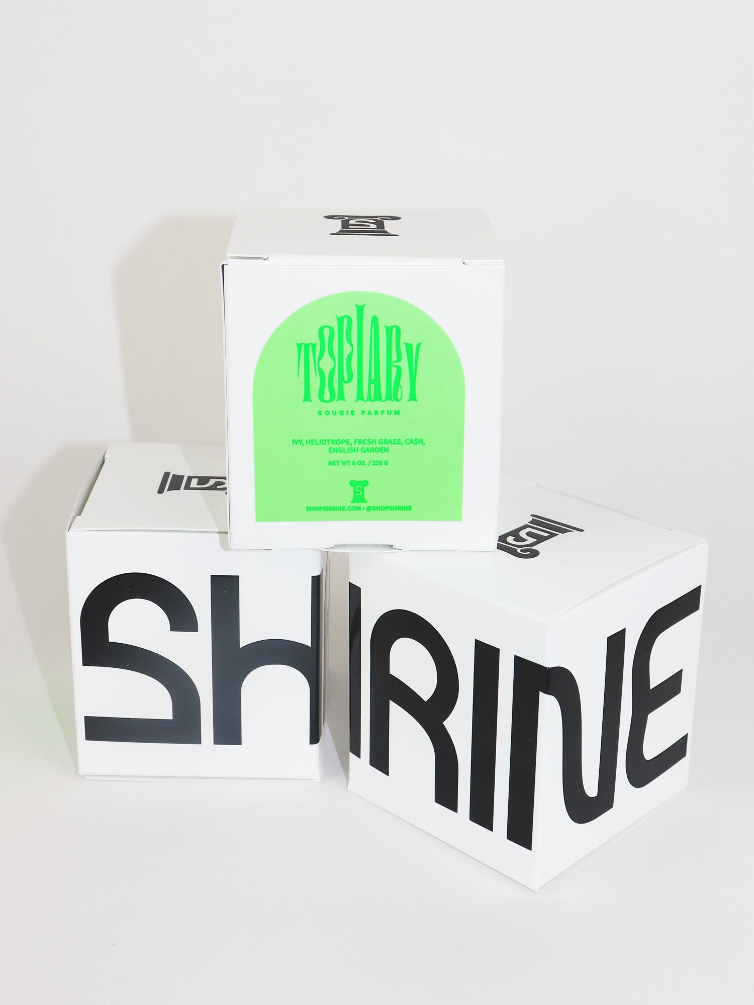 shrine topiary neon green monochromatic candle shop shrine black and white candle box shopshrine