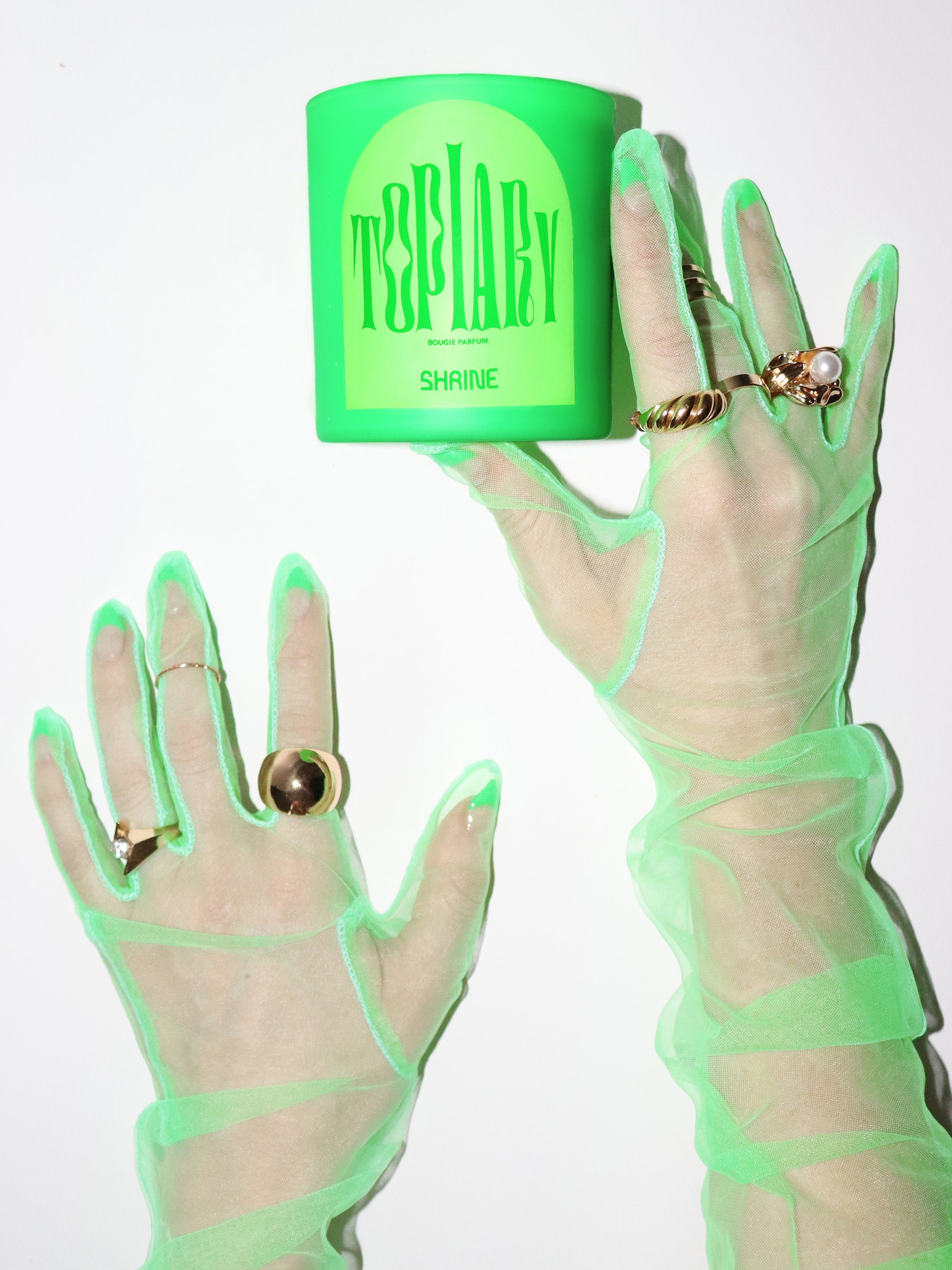 shrine topiary neon green candle with tulle glove hands